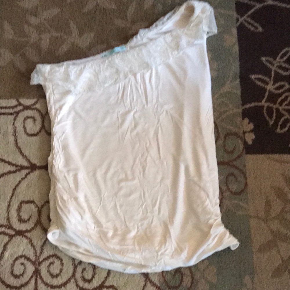 One-shoulder, cream colored top